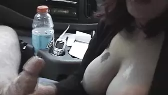 In the car between her tits